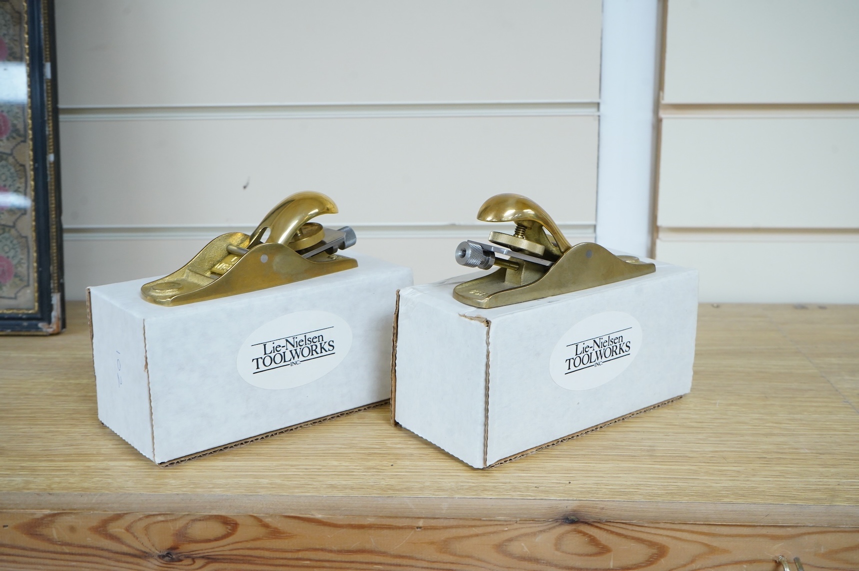 Two boxed Lie Nielsen Toolworks block planes; a bronze low angle block plane (L-N 102), together with a bronze standard block plane (L-N 103)